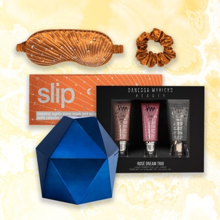 Best Gifts for the Person Who Has Everything: a collaged Slip Celestial Nights Gift Set, Danessa Myricks Dream Rose Trio, and Saje Aroma (Be) Free Cordless Diffuser on a marbled yellow background