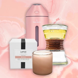 Lafco candle, Hey Dewy humidifier, and Hyascent diffuser on pink background with Best of Beauty seal